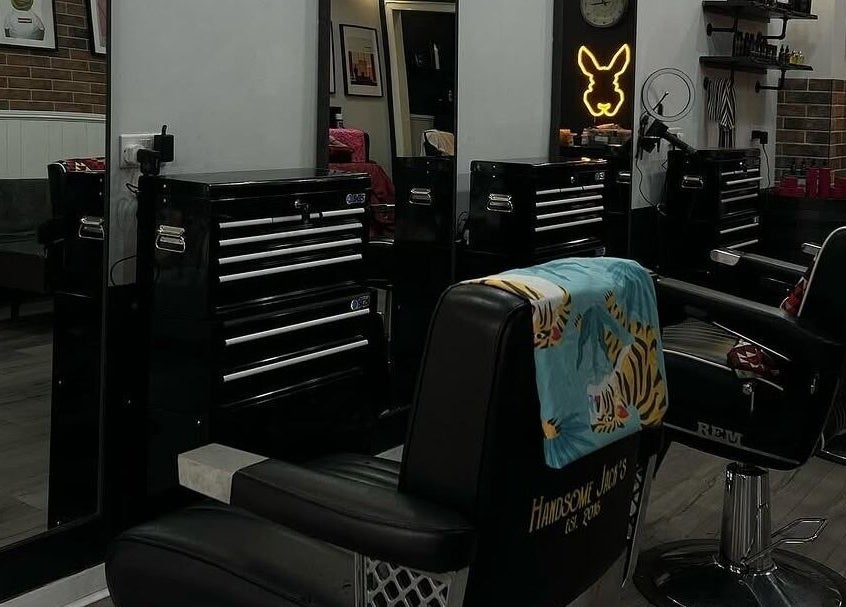 Interior of Handsome Jacks Shawlands in Glasgow, Scotland, GB, featuring stylish barber chairs and modern decor.