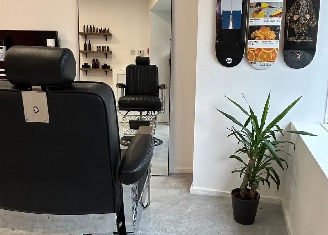 Stylish barber chair at Handsome Jacks Shawlands, Glasgow, Scotland, GB reflecting modern grooming ambiance.