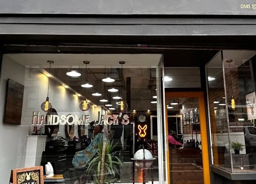 Front view of Handsome Jacks Dennistoun in Glasgow, Scotland, GB inviting with modern barber decor.