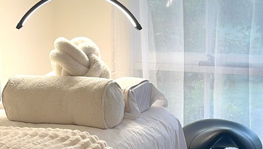 Luxurious spa setup at Barre & Co. Beauty, Melbourne, Victoria, AU, with cozy linens and natural light.