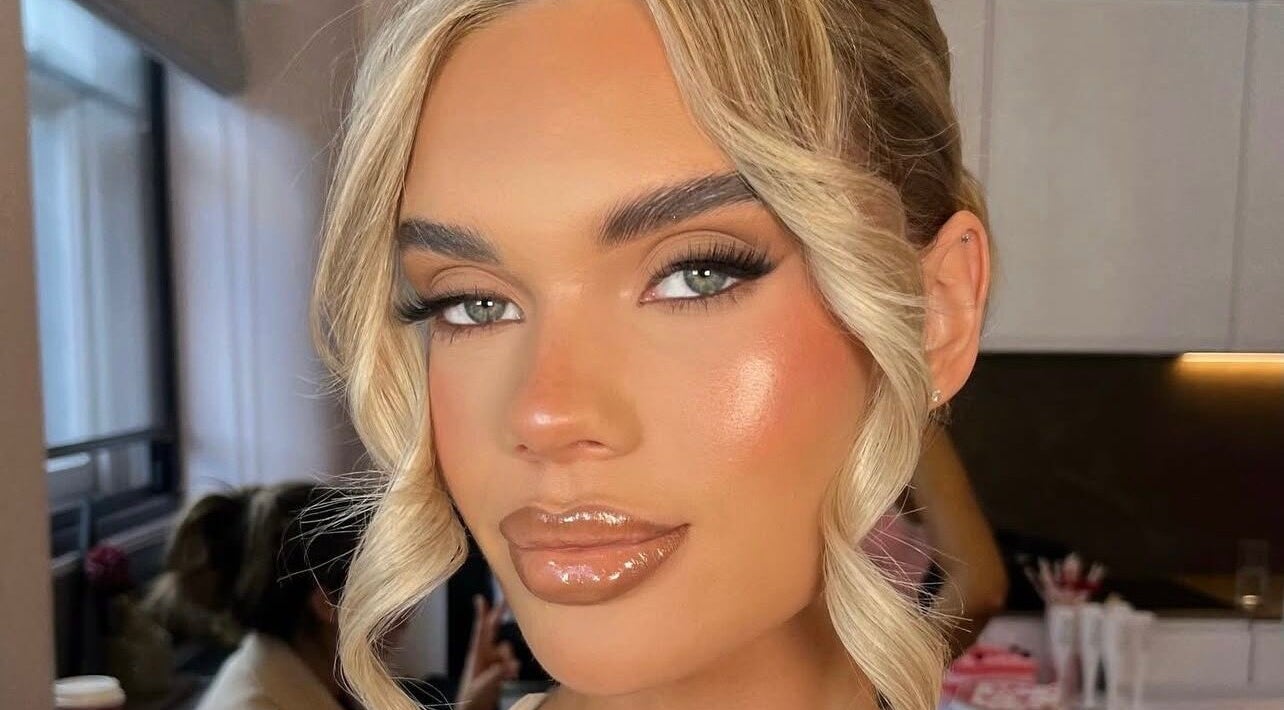 Elegant makeup look featuring glossy lips at Makeup by Ella, Liverpool, England, GB.