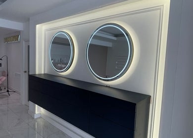 Chic salon interior with lighted mirrors at Makeup by Ella, Liverpool, England, GB.