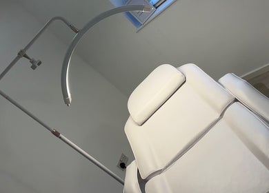 Comfortable reclining chair in treatment room at Mimis Aesthetics, Shipley, England, GB.
