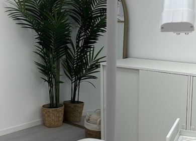 Tranquil corner at Mimis Aesthetics, Shipley, England, GB, featuring greenery and stylish decor.