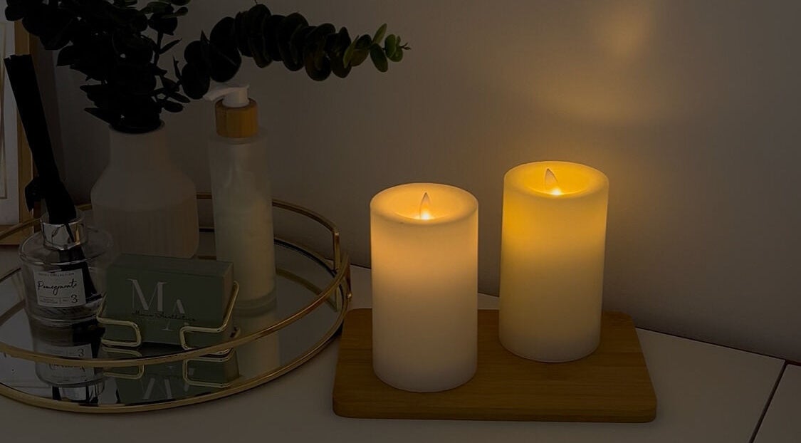 Warm candlelight ambiance at Mimis Aesthetics, Shipley, England, GB, enhancing relaxation and tranquility.