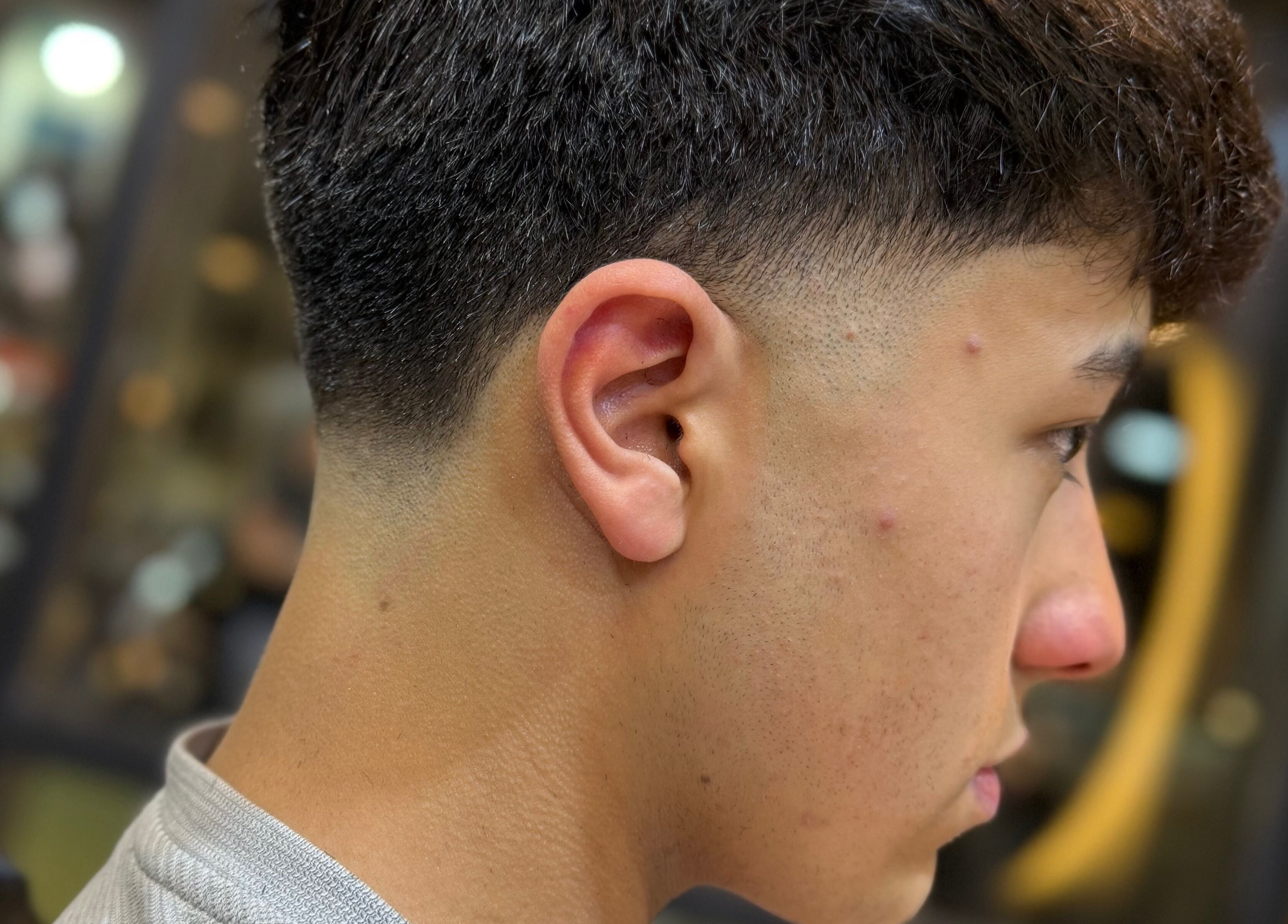 Sleek fade haircut at Salon Blue Shadow, عمّان, محافظة العاصمة, JO, enhancing modern style.