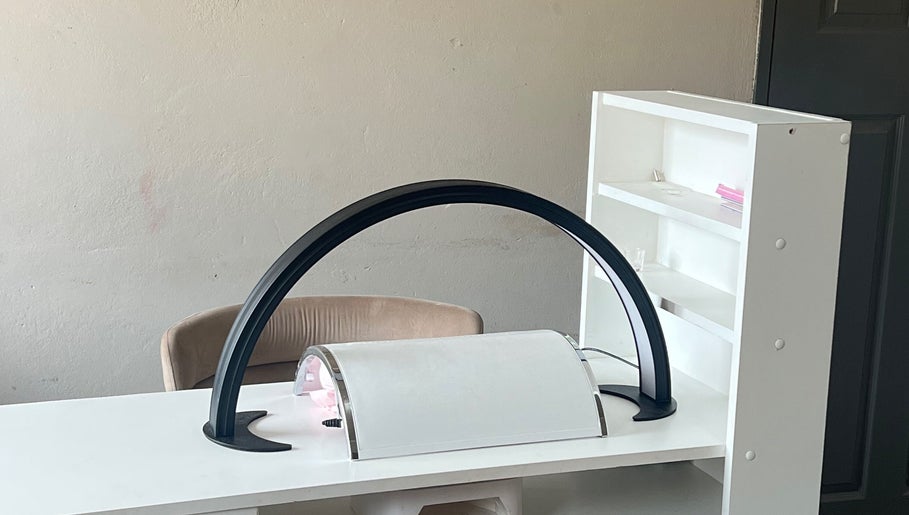 Modern nail station at Fefesnailboutique in Akasia, Gauteng, ZA featuring sleek design and manicure tools.