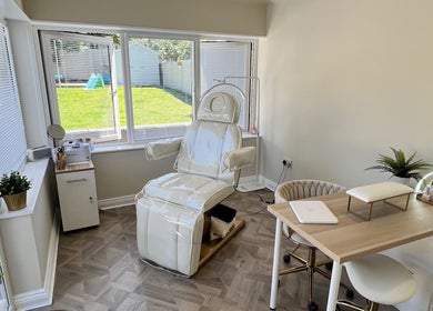 Relaxing salon at Beauty and Massage by Stef in Higherford, England, GB with modern chairs and bright windows.