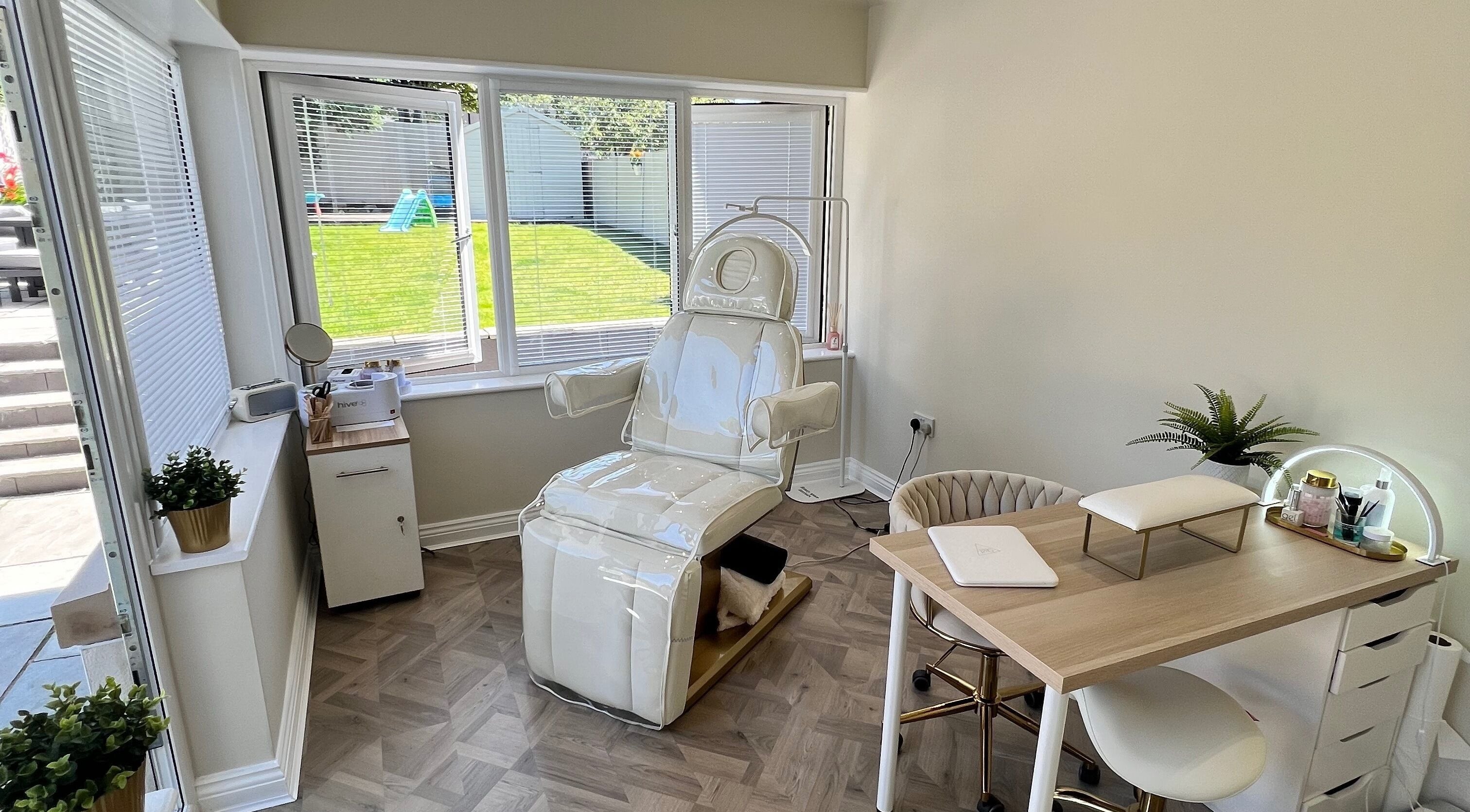 Relaxing salon at Beauty and Massage by Stef in Higherford, England, GB with modern chairs and bright windows.