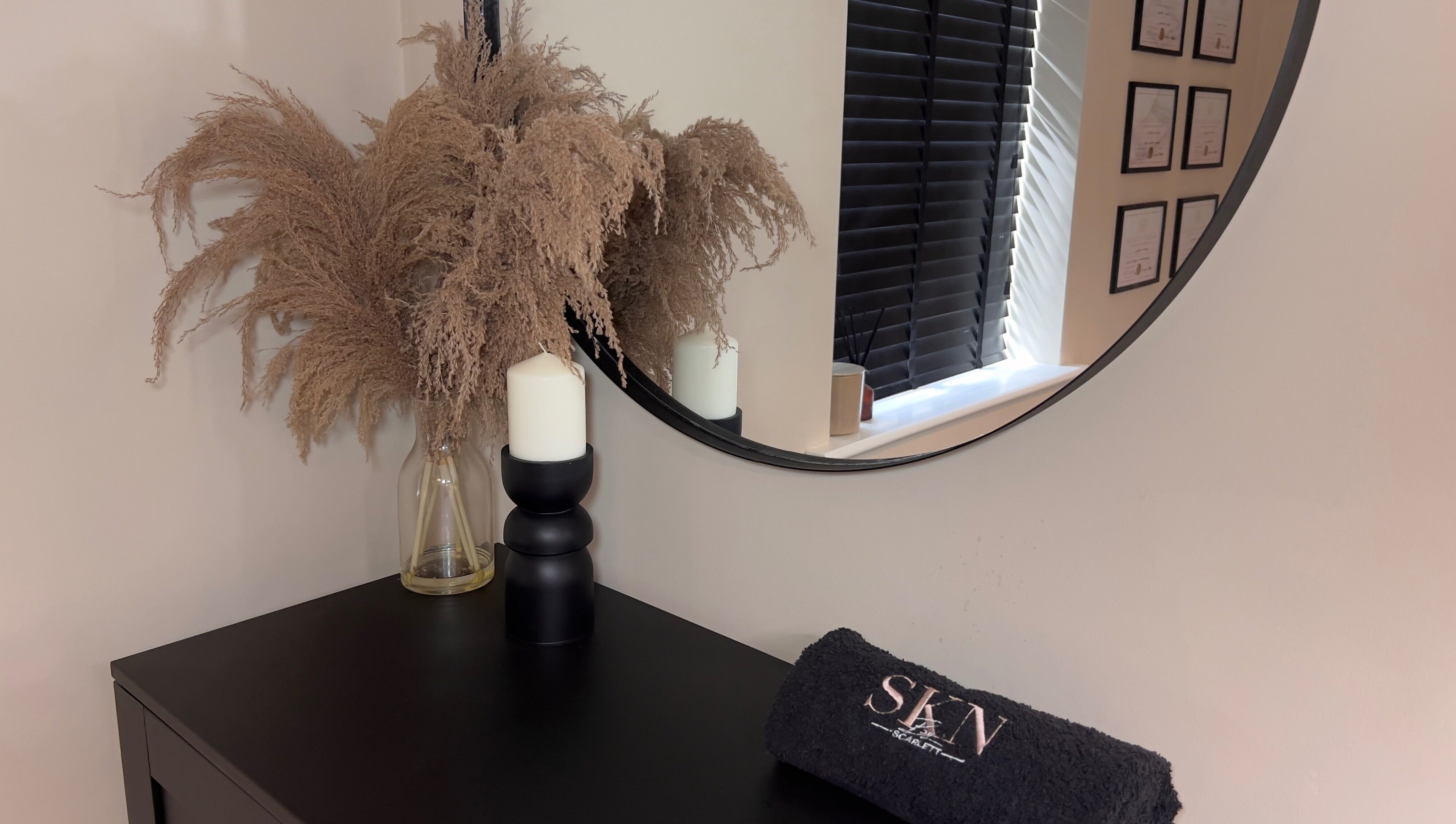 Elegant decor with mirror and candle at SKN by Scarlett - Warrington, Warrington, England, GB.