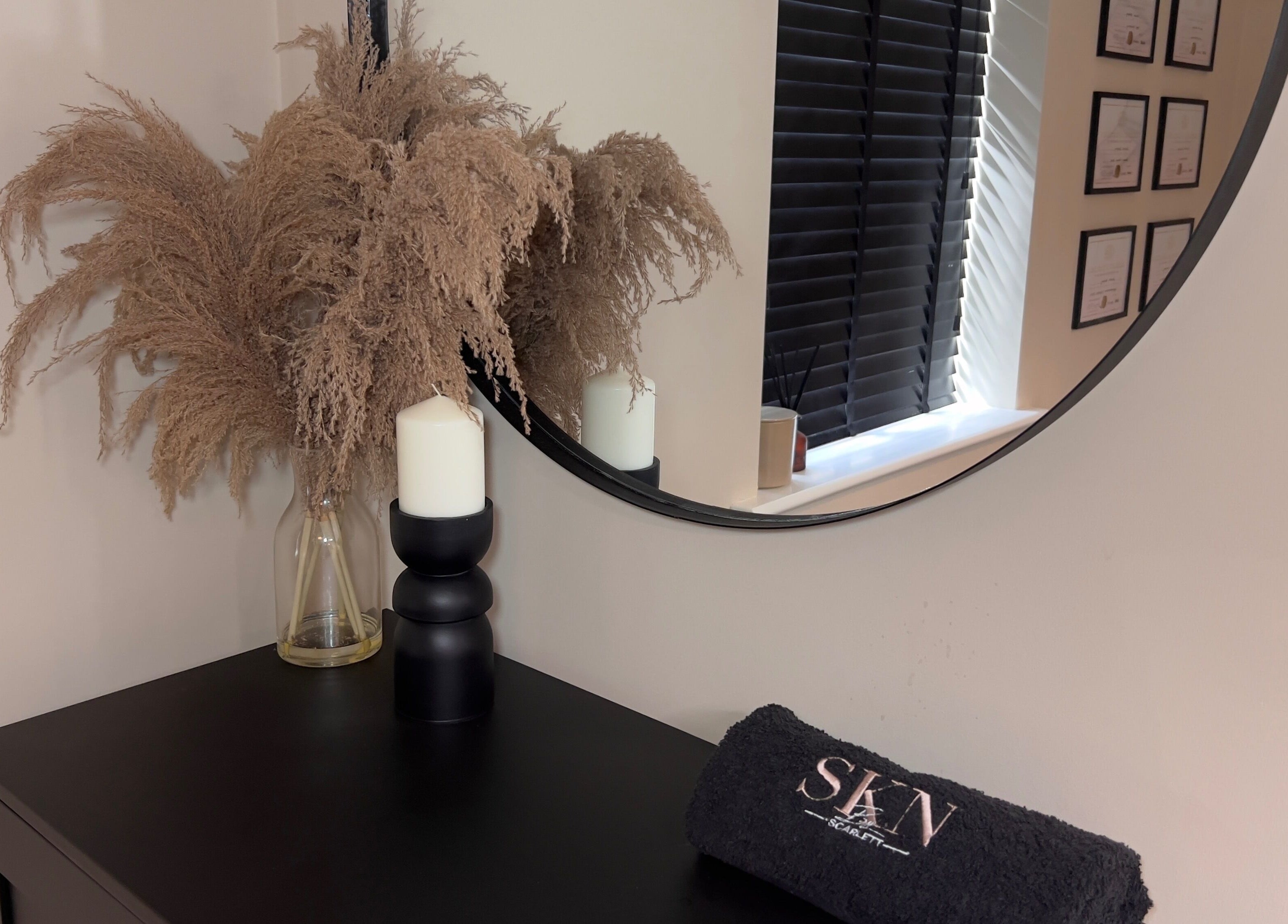 Elegant decor with mirror and candle at SKN by Scarlett - Warrington, Warrington, England, GB.