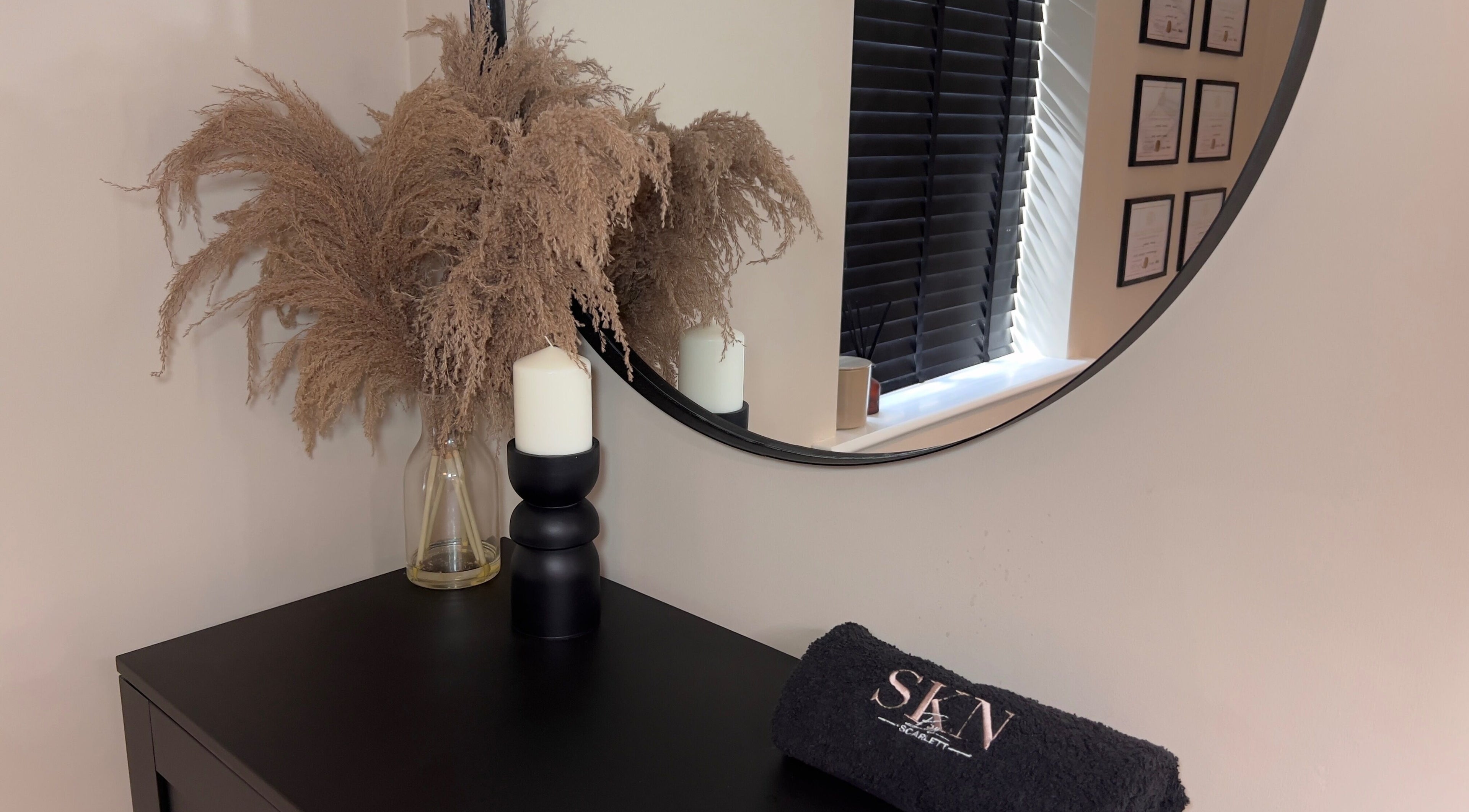 Elegant decor with mirror and candle at SKN by Scarlett - Warrington, Warrington, England, GB.