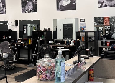 Modern barber interior at Cut Republic Connecticut, Cromwell, Connecticut, US, showcasing chairs and decor.