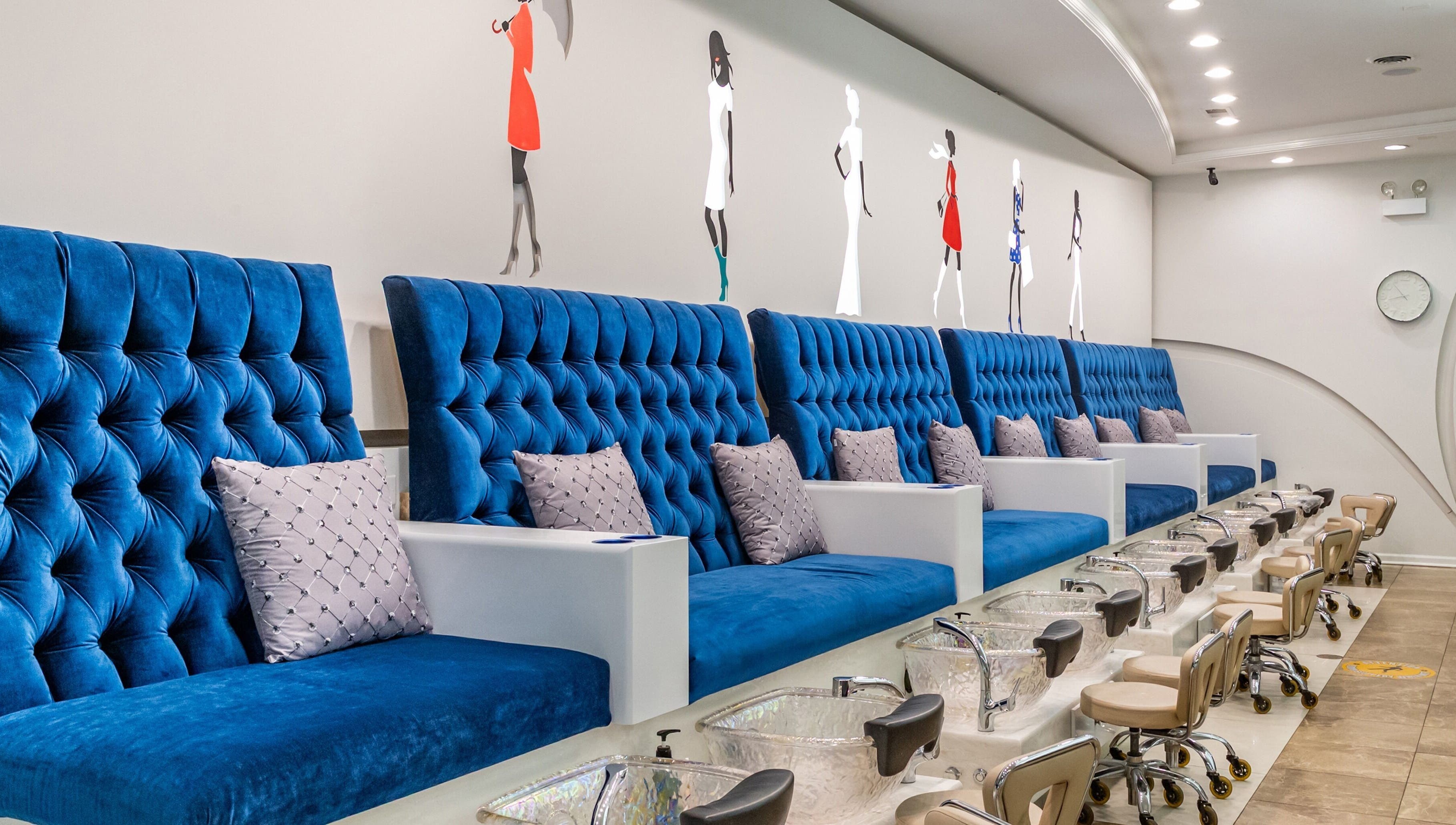 Luxurious blue spa chairs at Couture Nails and Waxing in Chicago, Illinois, US, ready for service.