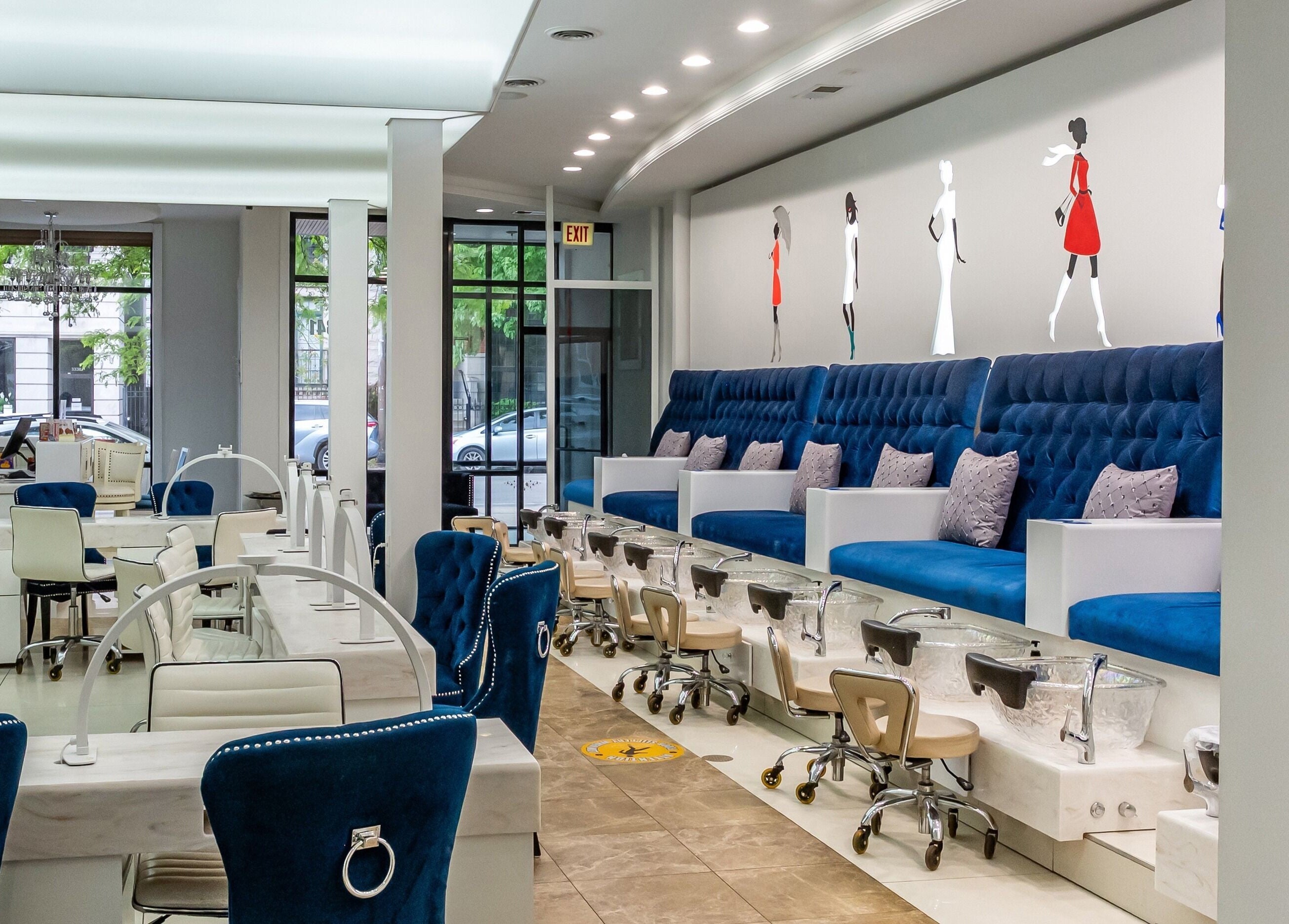 Elegant pedicure stations at Couture Nails and Waxing in Chicago, Illinois, US with modern, plush seating.