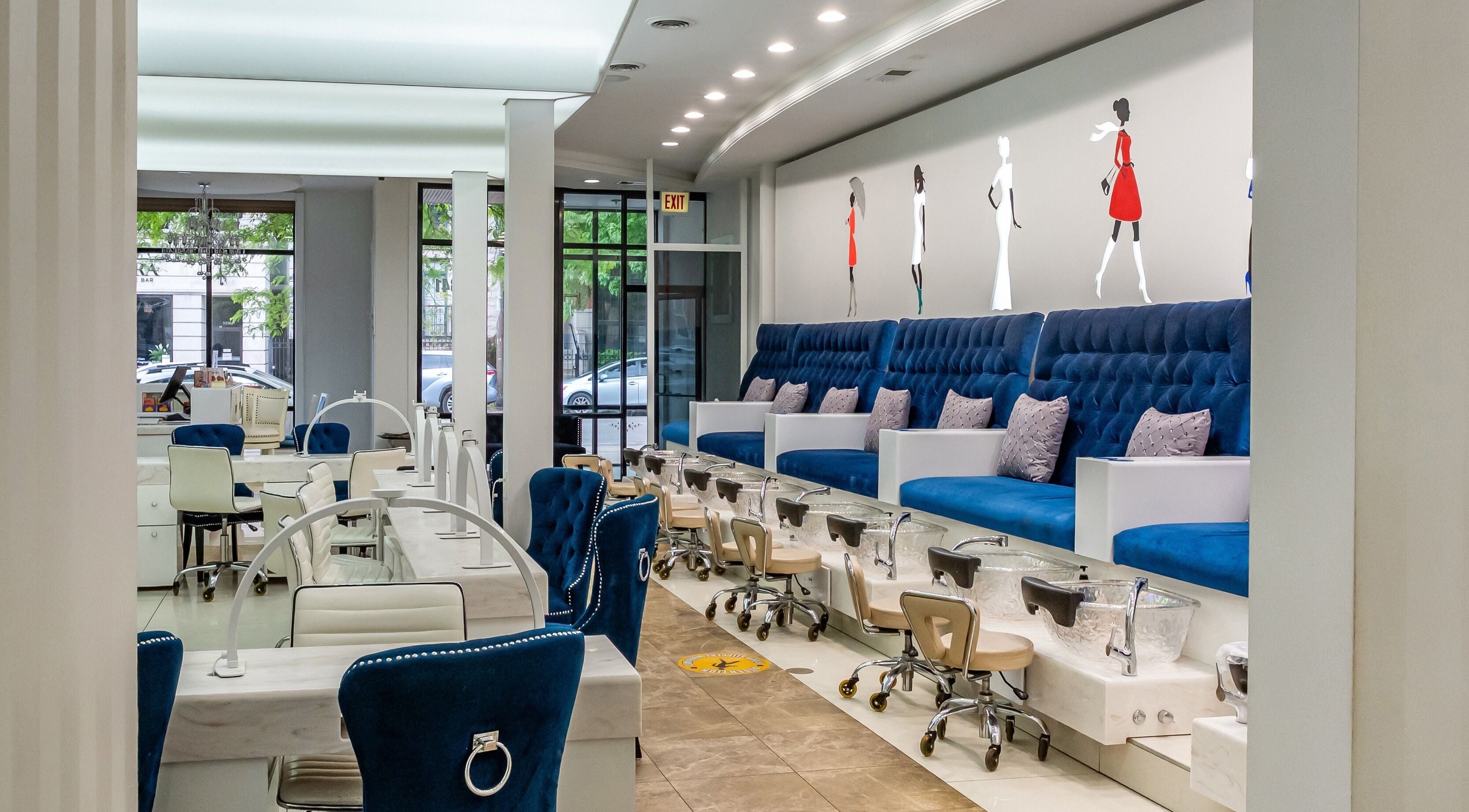Elegant pedicure stations at Couture Nails and Waxing in Chicago, Illinois, US with modern, plush seating.