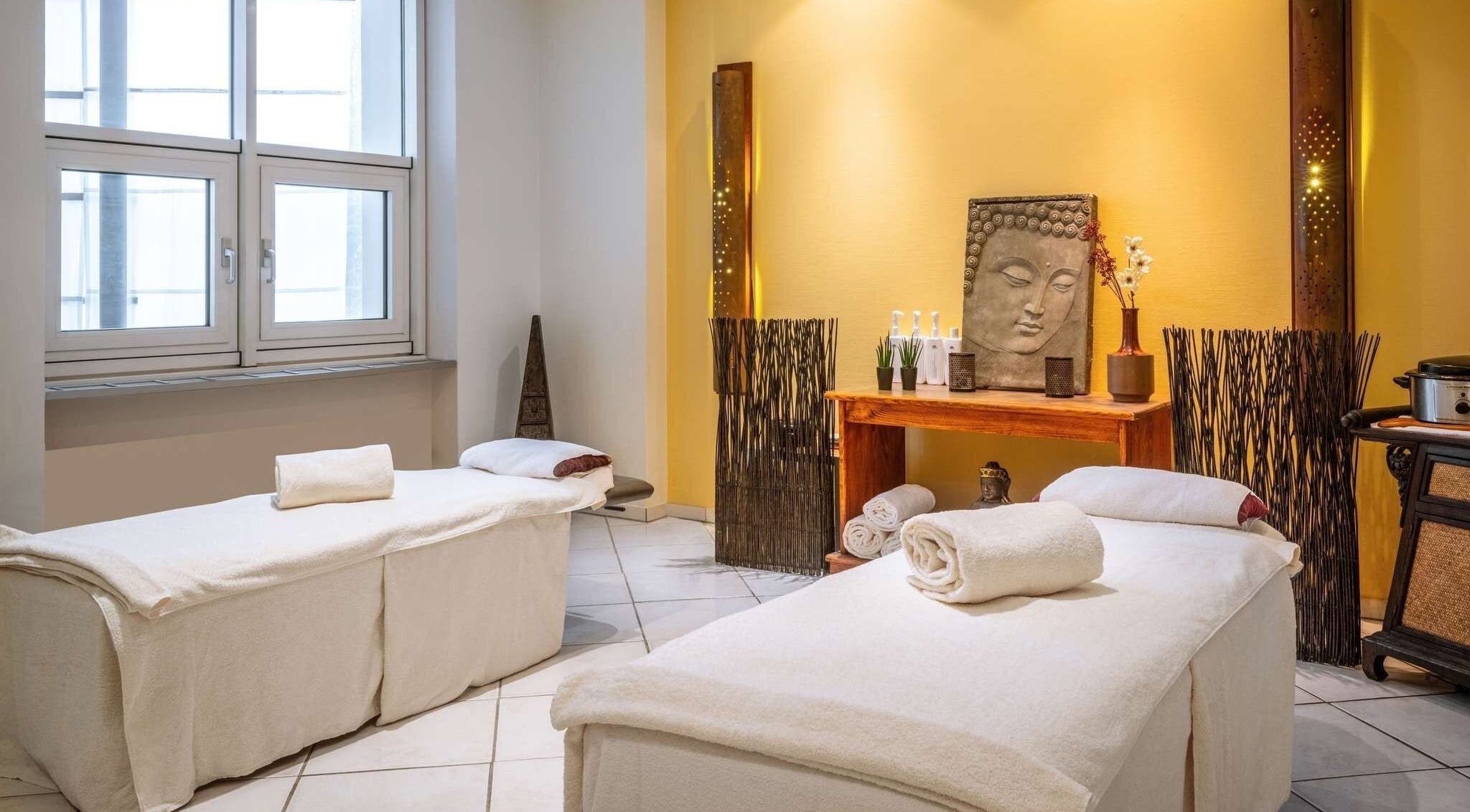 Relaxing massage room at Pullman Fit & Spa Lounge, Stuttgart, Baden-württemberg, DE with serene decor.