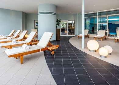 Relaxing lounge chairs at Pullman Fit & Spa Lounge, Stuttgart, Baden-württemberg, DE, offering tranquil wellness.