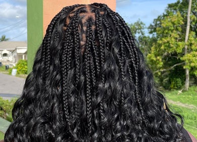 Intricate braids styled at Hair Affair in Eastlynne, Saint George, BB, showcasing professional artistry.