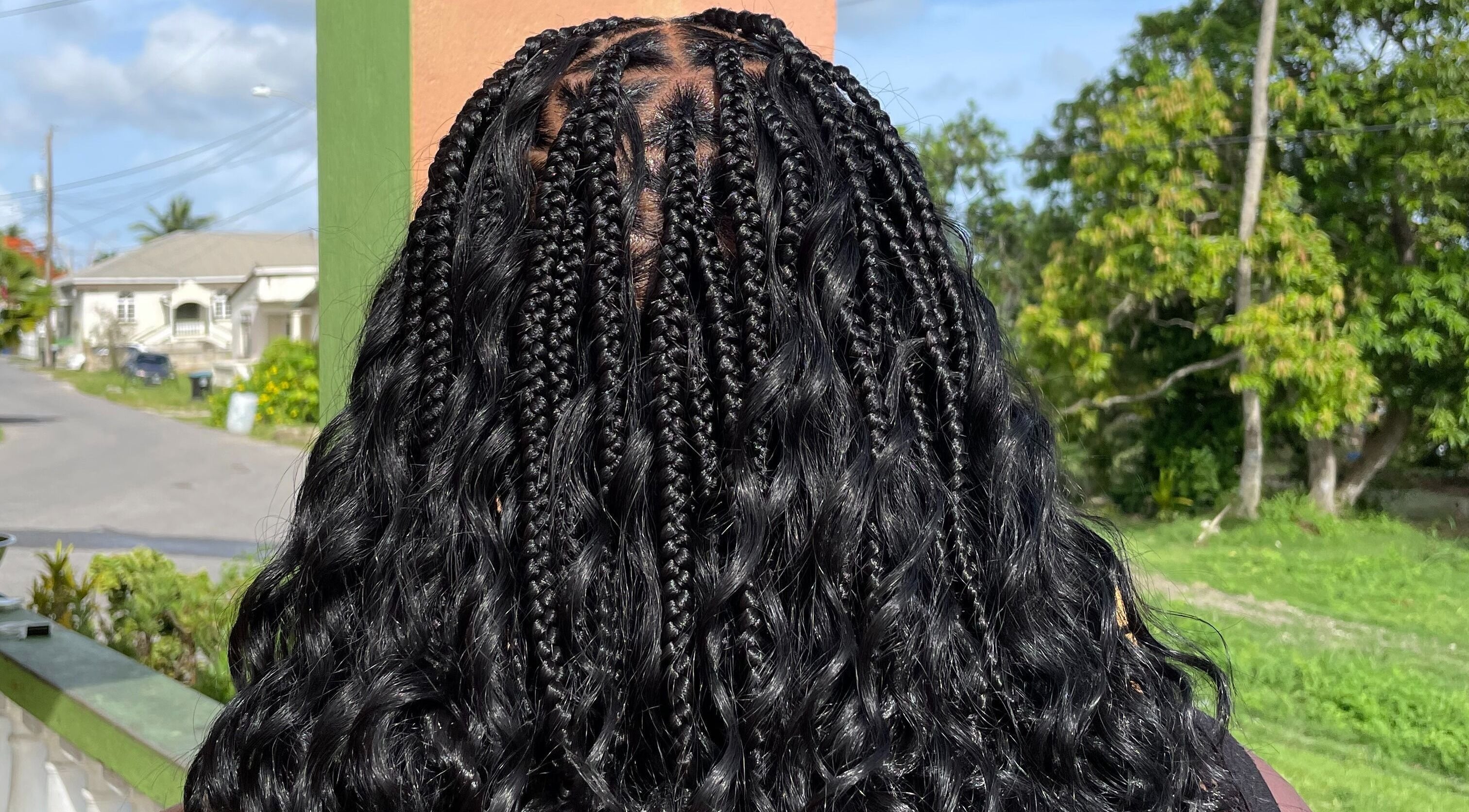 Intricate braids styled at Hair Affair in Eastlynne, Saint George, BB, showcasing professional artistry.