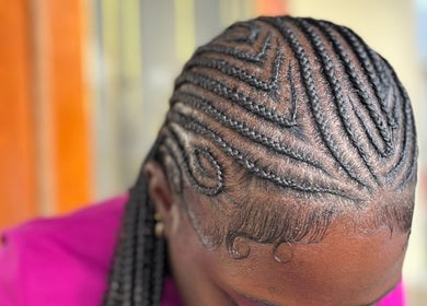Intricate braided hairstyle created at Hair Affair, Eastlynne, Saint George, BB.