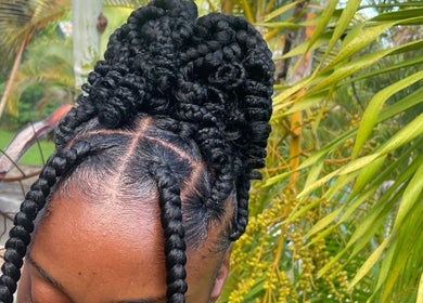 Intricate braided hairstyle from Hair Affair in Eastlynne, Saint George, BB, showcasing expert styling.