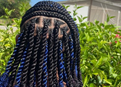 Intricate black and blue braids at Hair Affair, Eastlynne, Saint George, BB.