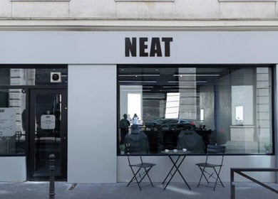 Modern exterior of SinayRkut in Paris, Île-de-france, FR, showcasing stylish seating and sleek design.