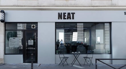 Modern exterior of SinayRkut in Paris, Île-de-france, FR, showcasing stylish seating and sleek design.