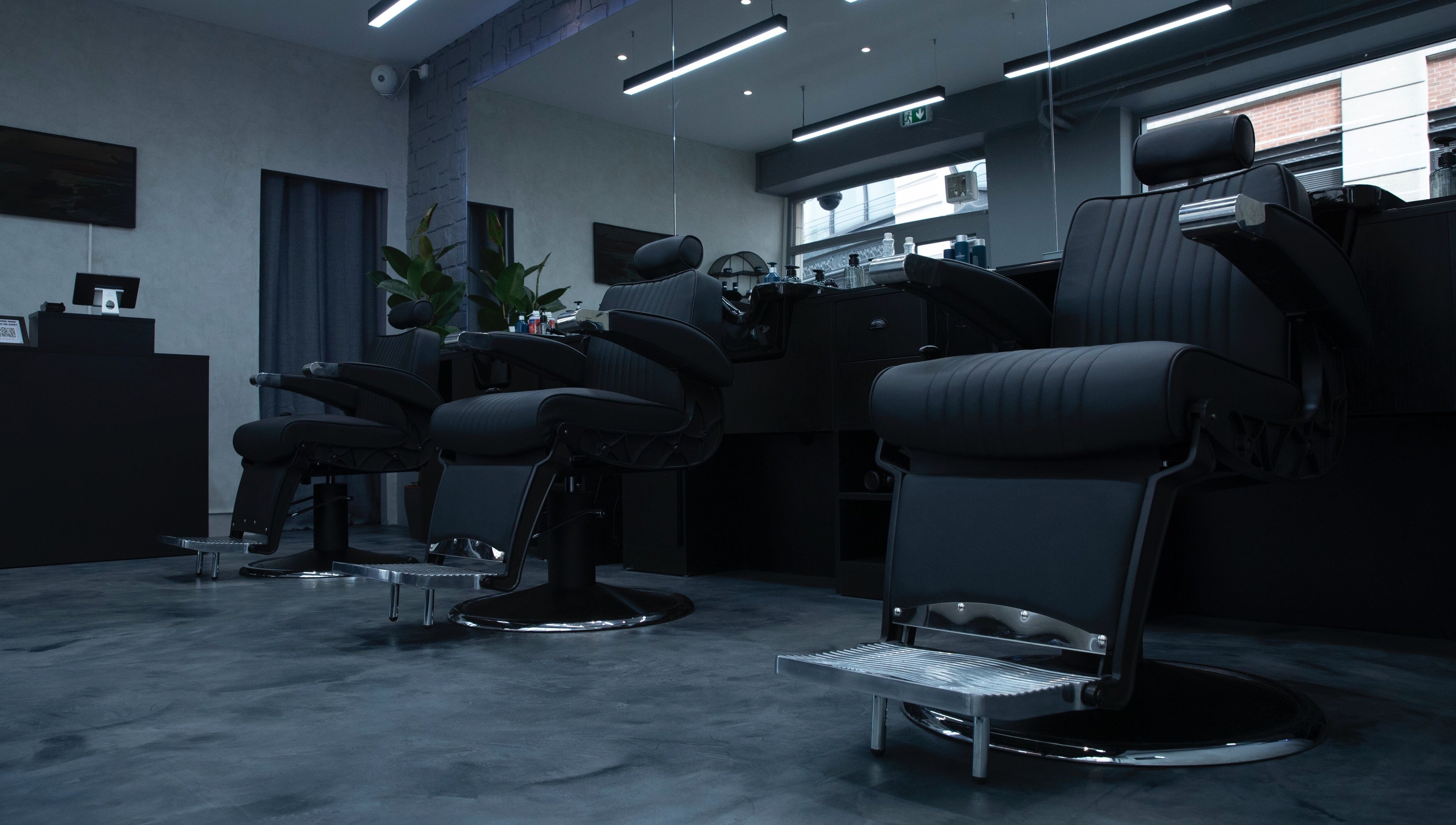 Modern barber chairs at Yanis - NEAT, Paris, Île-de-france, FR, showcasing sleek style and comfort.