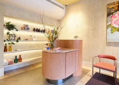 Chic reception at Sage Space, Darlinghurst NSW, featuring modern decor and floral art.