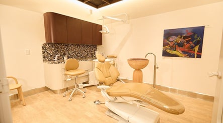 Elegant treatment room at Sage Space, Darlinghurst, New South Wales, AU with modern equipment and art.