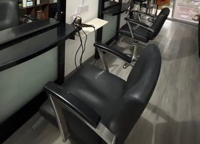 Stylish salon chairs at Rich Salon Muslimah, Kota Bharu, Kelantan, MY offering a chic ambiance.