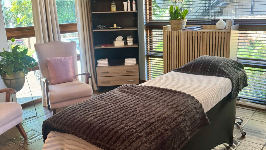 Relaxing treatment room at Lumea Beauty Aesthetics, Centurion, Gauteng, ZA with a plush treatment bed and serene decor.