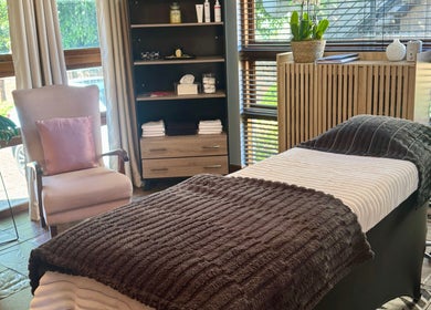 Relaxing treatment room at Lumea Beauty Aesthetics, Centurion, Gauteng, ZA with a plush treatment bed and serene decor.