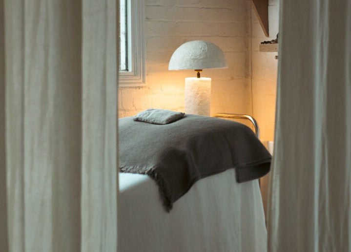 Tranquil massage room at In Our Neighbourhood Apothecary, London, England, GB.