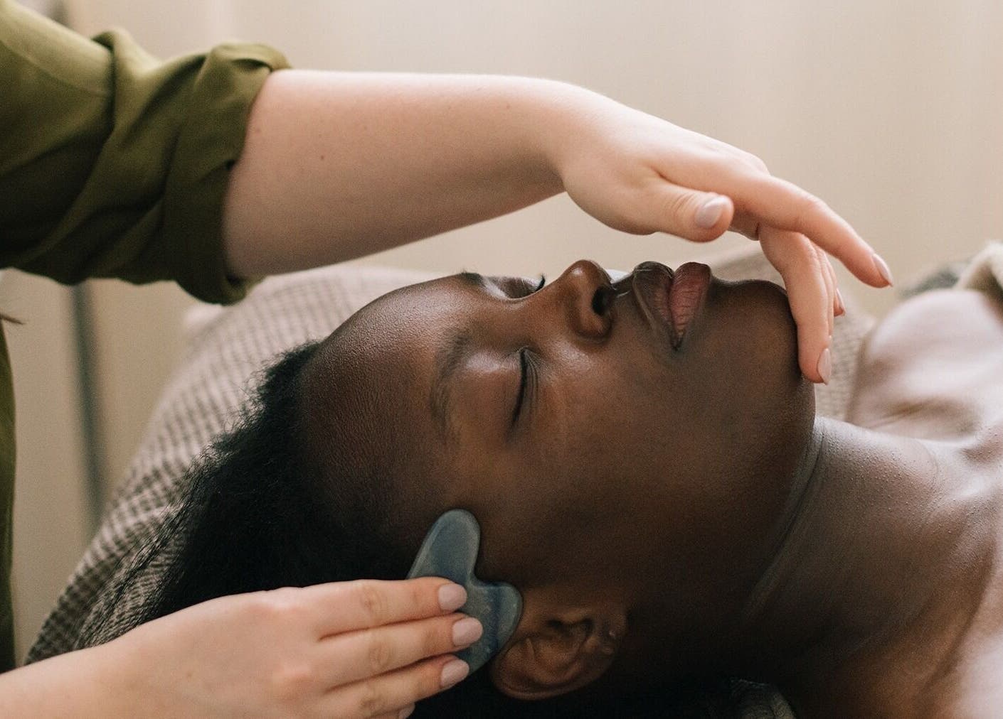 Gua Sha facial massage at In Our Neighbourhood Apothecary, London, England, GB offering soothing relaxation.