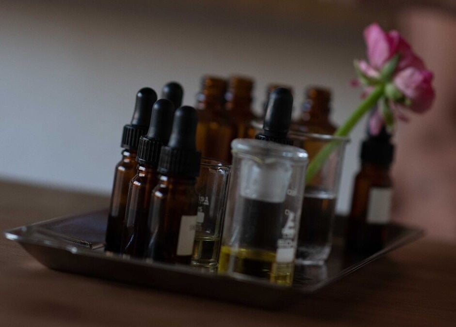 Essential oil bottles on a tray at In Our Neighbourhood Apothecary, London, England, GB.