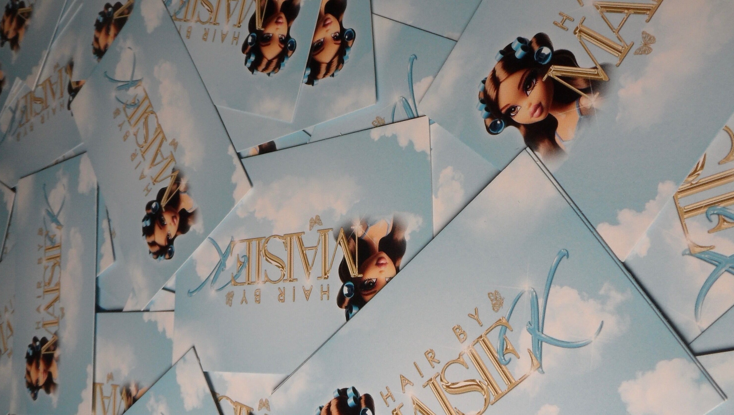 Collage of branded cards from Hair By Maisie K in Middlesbrough, England, GB, showcasing unique design.