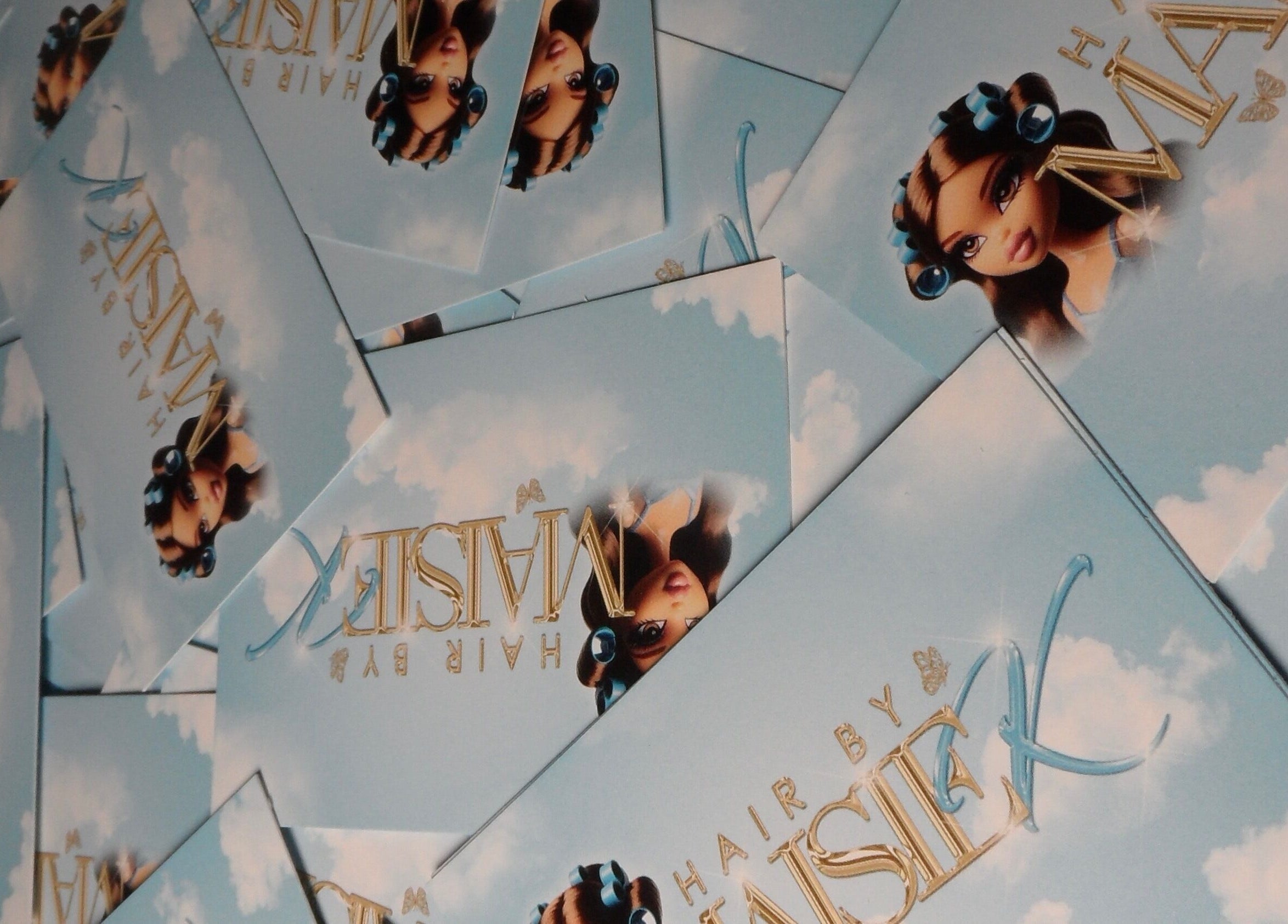 Collage of branded cards from Hair By Maisie K in Middlesbrough, England, GB, showcasing unique design.