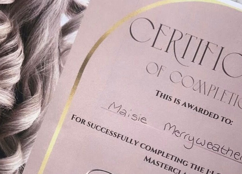 Certificate of completion next to styled curls at Hair By Maisie K, Middlesbrough, England, GB.