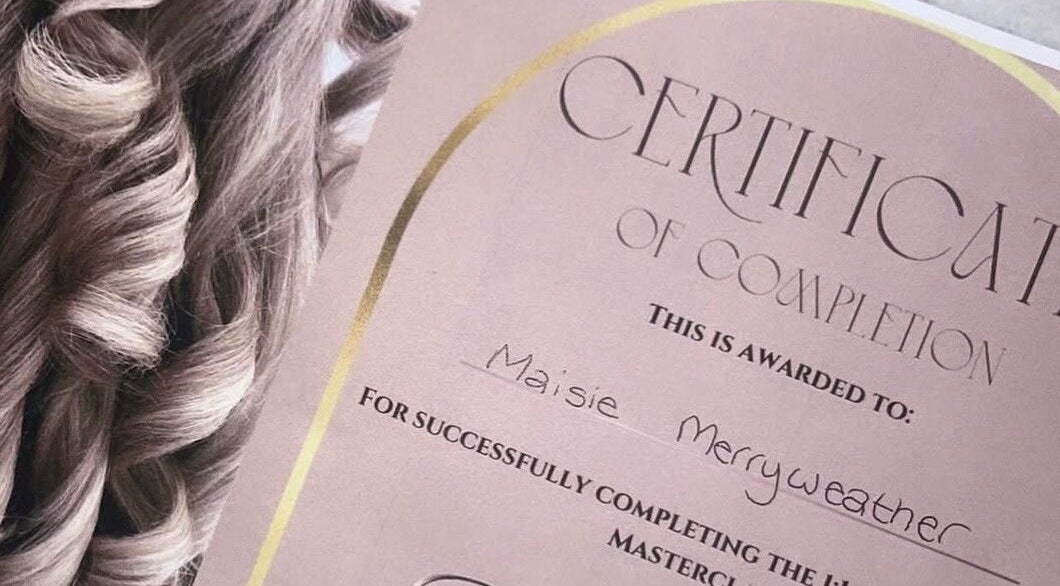 Certificate of completion next to styled curls at Hair By Maisie K, Middlesbrough, England, GB.