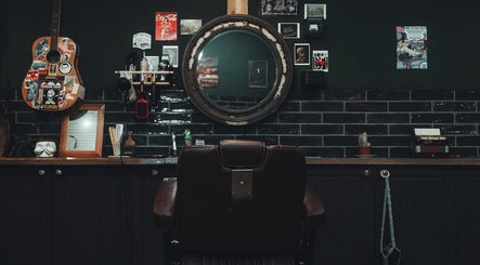 Cozy vintage barber setup at Lost & Found, Sheffield, England, GB showcasing unique decor and styling chair.