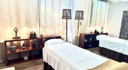 Relaxing spa room at Earth&Sky, Sant Antoni De Portmany, Illes Balears, ES, featuring soothing decor and massage beds.