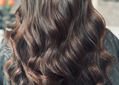 Elegant curled hairstyle at Hair By Terese in Hockley, England, GB, showcasing luxury and style.
