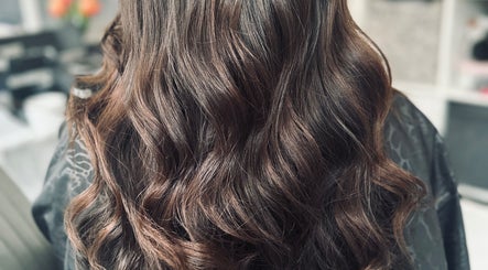 Elegant curled hairstyle at Hair By Terese in Hockley, England, GB, showcasing luxury and style.