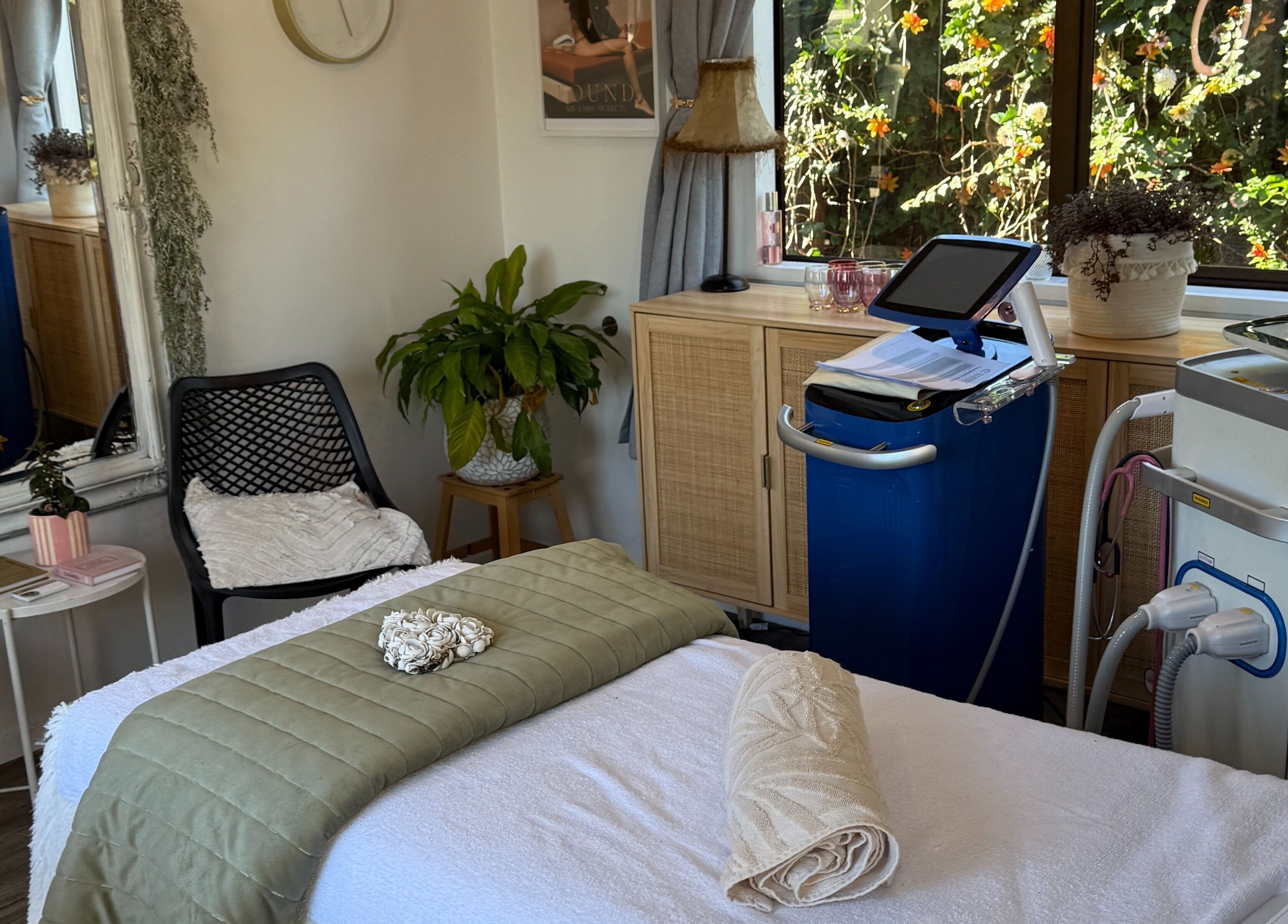 Serene beauty room at Found Skin, Mount Maunganui, Bay Of Plenty, NZ, featuring treatment bed and decor.