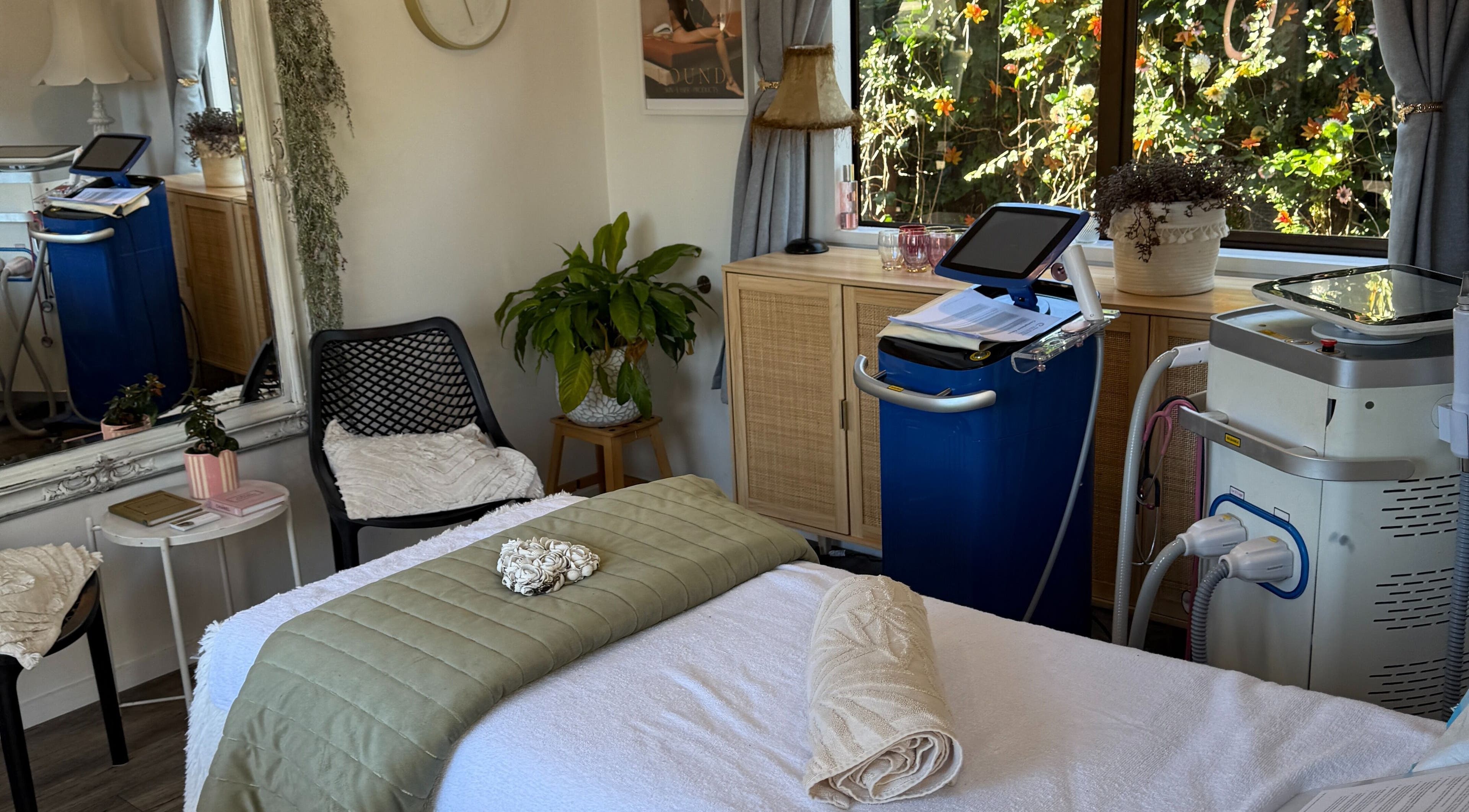 Serene beauty room at Found Skin, Mount Maunganui, Bay Of Plenty, NZ, featuring treatment bed and decor.