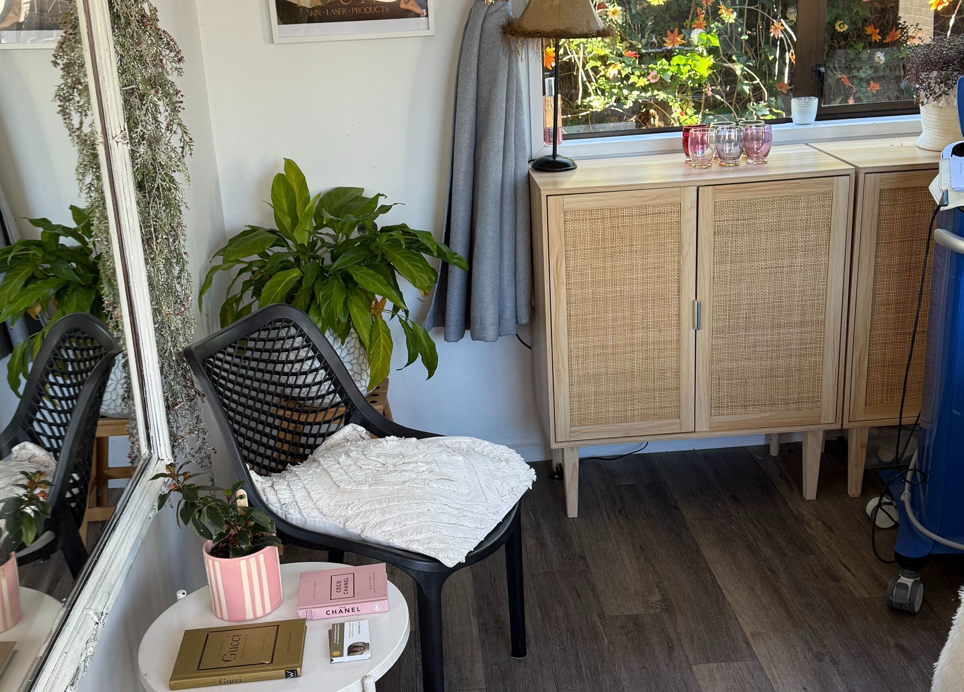 Relaxing corner with plants and decor at Found Skin, Mount Maunganui, Bay Of Plenty, NZ.