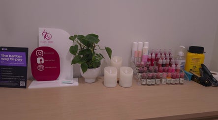 Omni Skin Clinic in Brabham, Western Australia showcases beauty products, candles, and greenery in a chic display.
